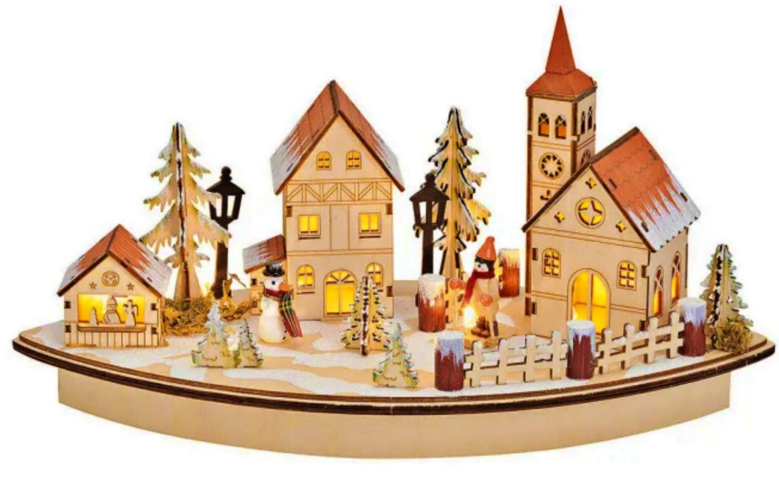 Decorated and illuminated winter landscape made of filigree wood. Dimensions 36 x 20 x 17 cm. Idyllic Christmas decoration