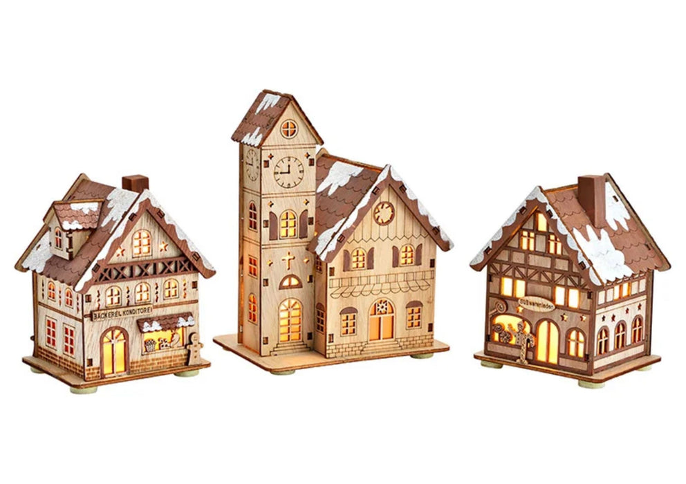 Decorated and illuminated CANDY SHOP made of delicately crafted wood. Dimensions 8 x 12 x 9 cm. Idyllic Christmas decoration