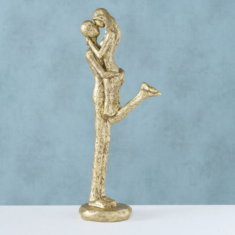 Kunst Figur, Skulptur in Handarbeit gefertigt, Modell ELVOS , Polyresin goldfarben matt im antik finish, durch wundervolles Design in Szene gesetzt, 35 x 13 x 8,5 cm