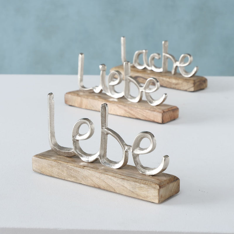 3er Set Aufsteller, top angesagt, Modelle: LEBE, LIEBE, LACHE. Sockel aus Mango Holz, Schriften aus Aluminium, Maße je Stück 23 x 12 x 5 cm