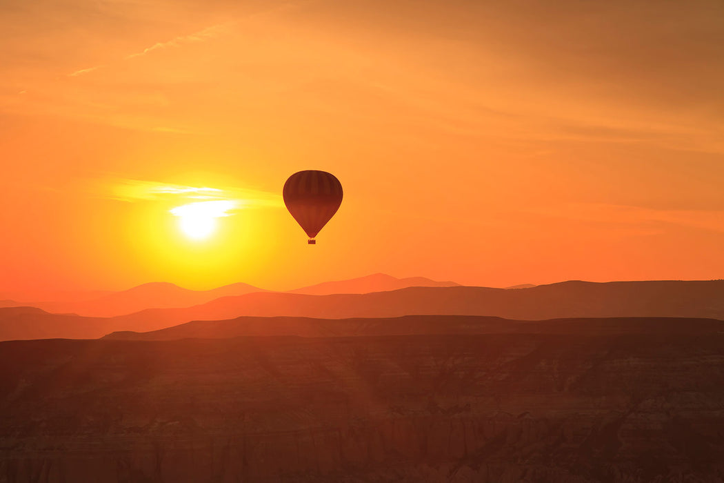 Fototapete Heissluftballon bei Sonnenuntergang