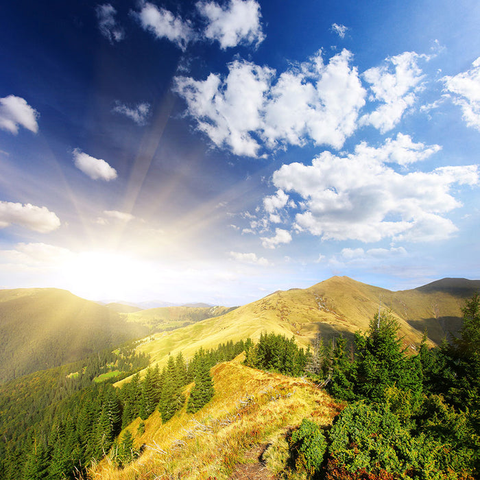 Fototapete Sonnenaufgang im Gebirge