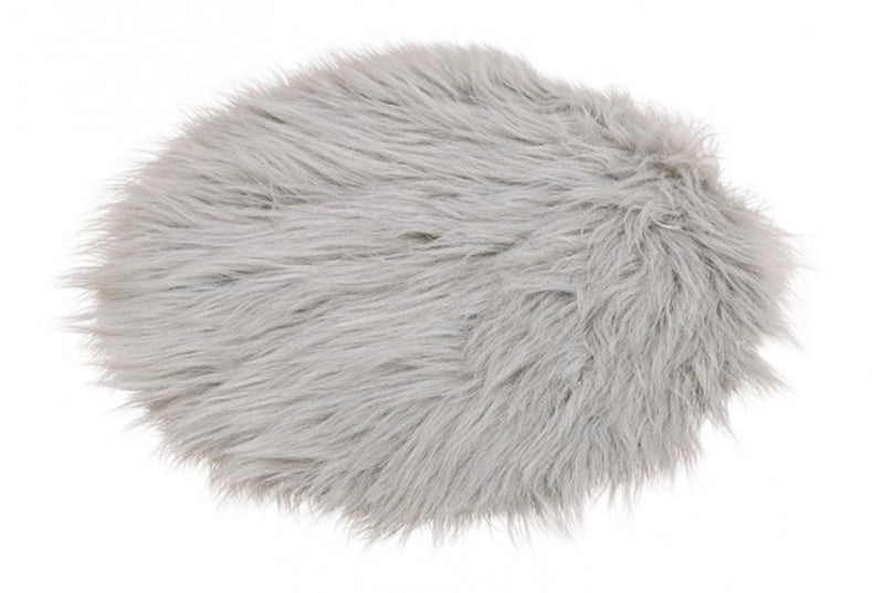 Tolles Kunstfell als Sitzauflage oder Teppichvorleger. Farbe silbergrau. Durchmesser 35 cm, ca. 5 cm lange Kunsthaare, 30 Grad waschbar,