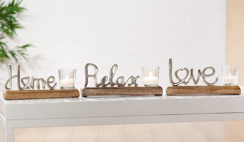 Edler Schriftzug mit Teelichthalter auf Holz in brüniertem Aluminium als Aufsteller, Modell: Love , Maße 22,5 x 12 x 4 cm
