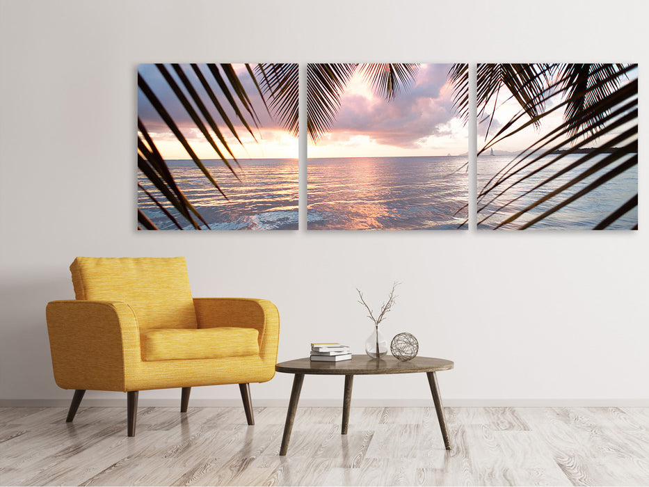 Panoramic 3-piece canvas picture Under palm leaves