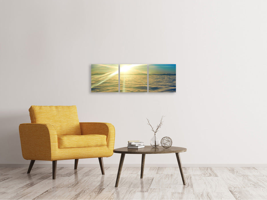 Panoramic 3-piece canvas picture Sunrise above the clouds