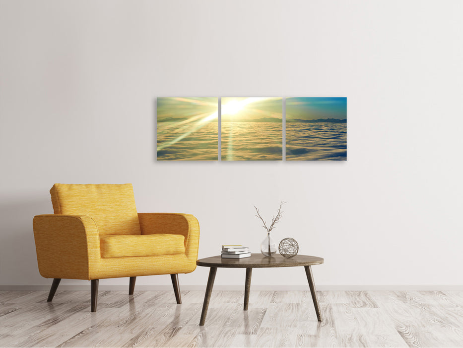 Panoramic 3-piece canvas picture Sunrise above the clouds