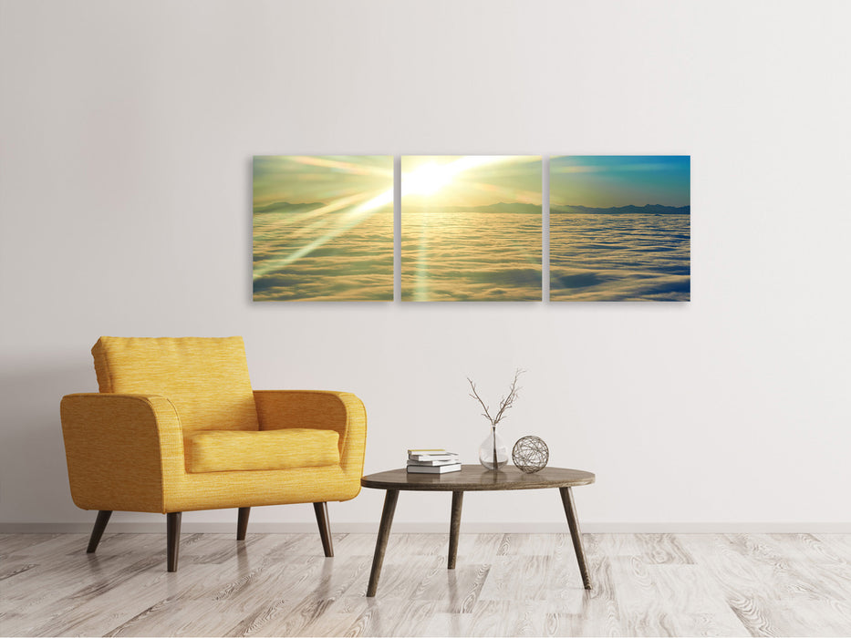 Panoramic 3-piece canvas picture Sunrise above the clouds