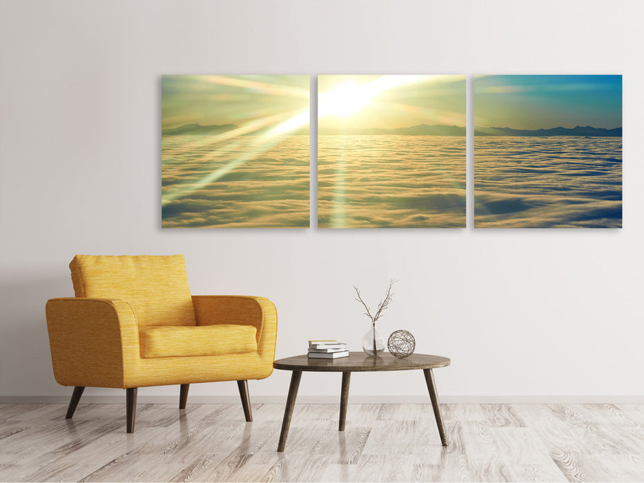 Panoramic 3-piece canvas picture Sunrise above the clouds