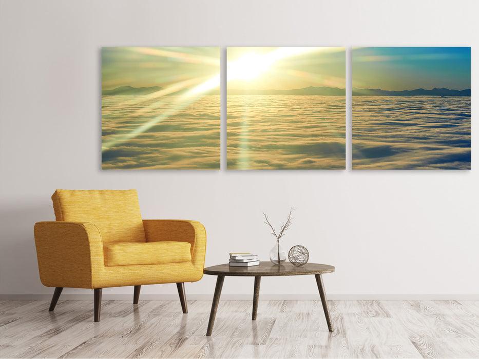 Panoramic 3-piece canvas picture Sunrise above the clouds