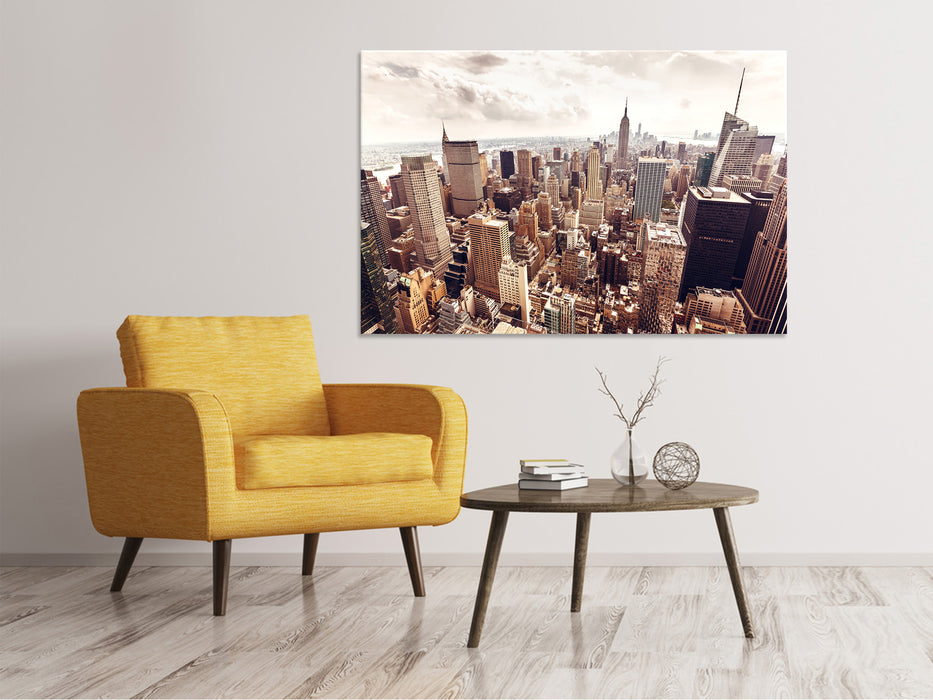 Canvas print skyline above the roofs of Manhattan