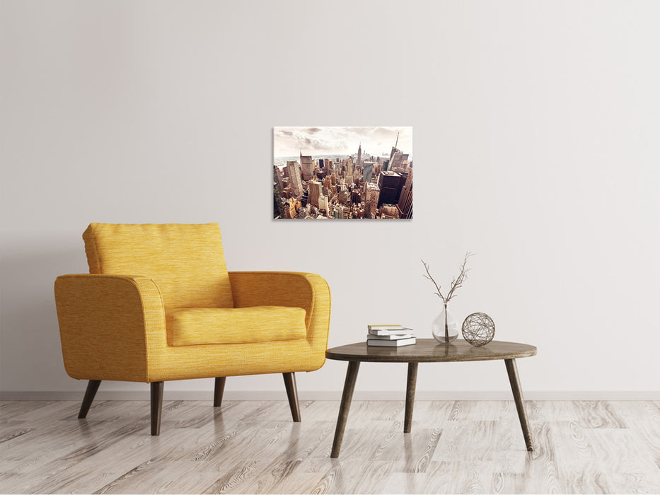 Canvas print skyline above the roofs of Manhattan