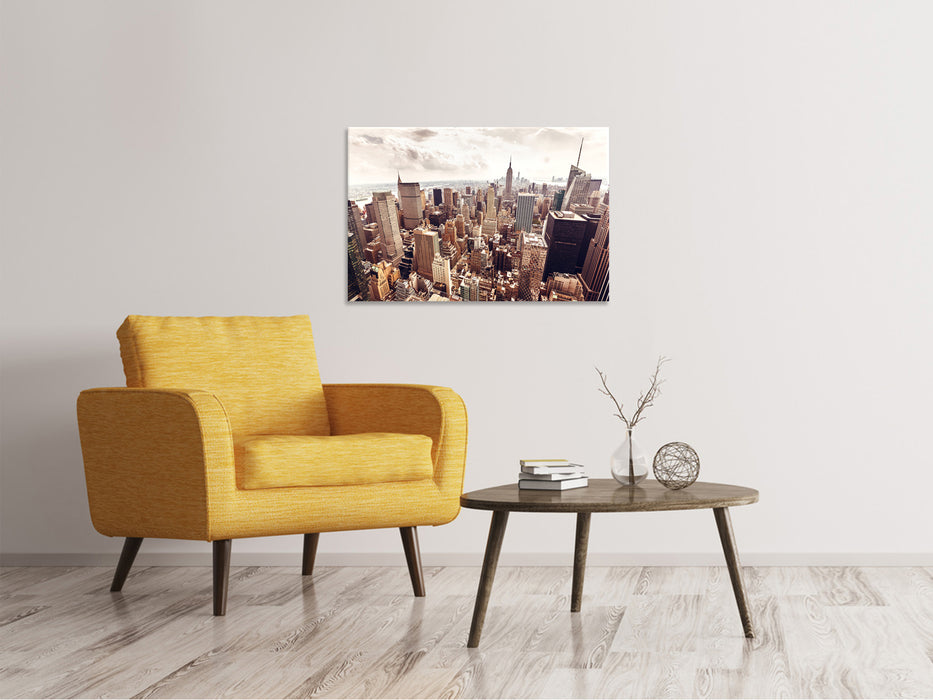 Canvas print skyline above the roofs of Manhattan