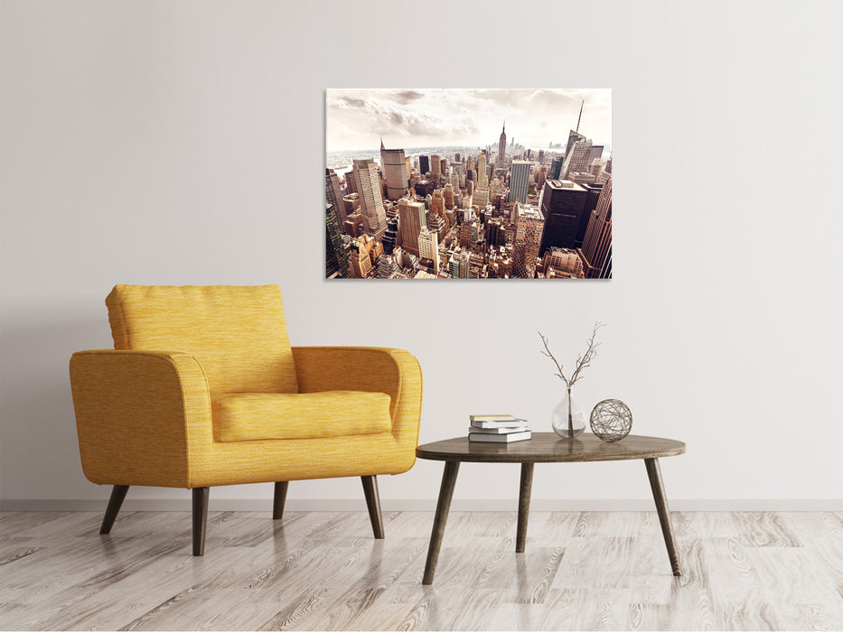 Canvas print skyline above the roofs of Manhattan