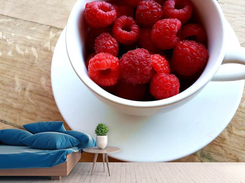 Fototapete Eine Tasse Himbeeren