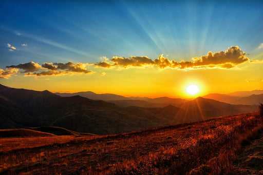 Fototapete Sonnenuntergang in der Welt der Berge