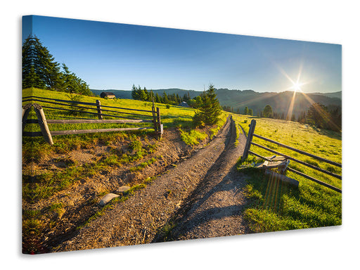 Leinwandbild Sonnenaufgang am Berg