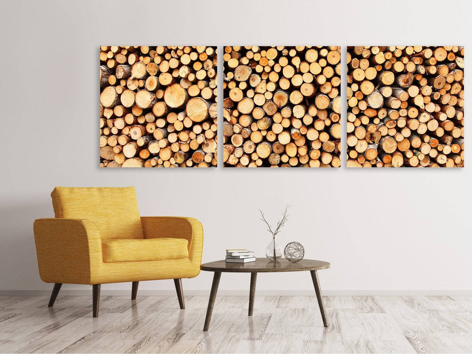 Panoramic 3-piece canvas picture of wooden trunks